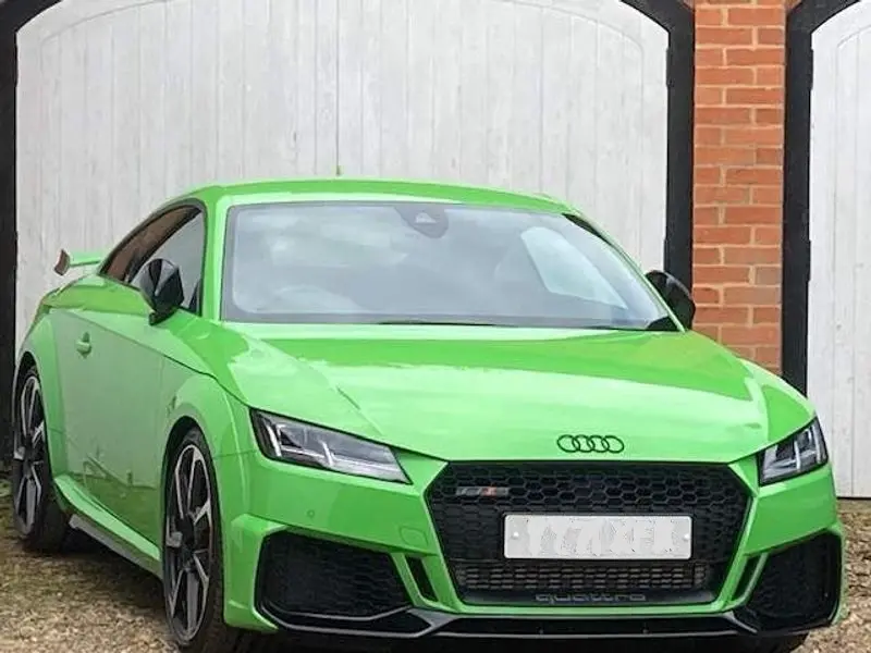 Side profile of the Audi TT RS sports car available for rent