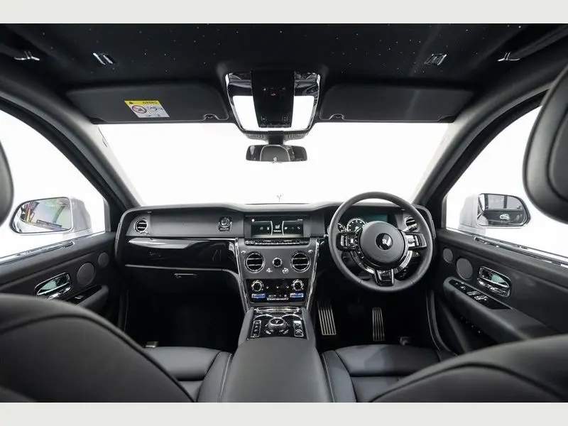 Rear view of a pristine Rolls Royce Cullinan for rental